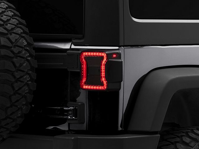 Raxiom LED Tail Lights; Red Housing; Smoked Lens (07-18 Jeep Wrangler JK)