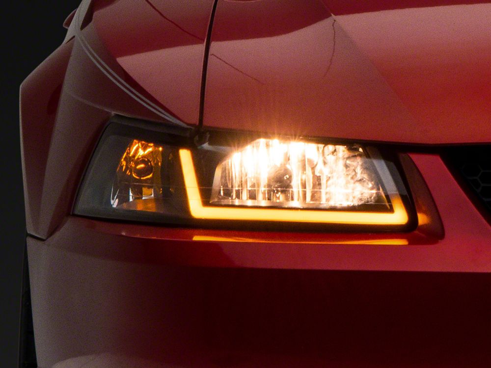 Raxiom Axial Series Headlights with Sequential LED Bar Black Housing Clear Lens 99 04 Mustang