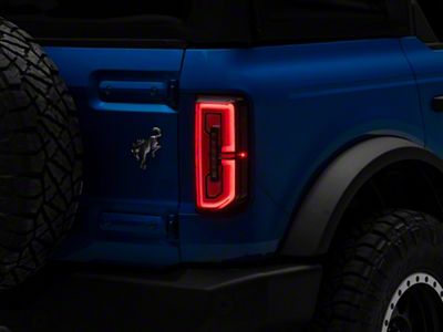 Raxiom Sequential LED Tail Lights; Black Housing; Clear Lens (21-23 Bronco w/ Factory Halogen Tail Lights)