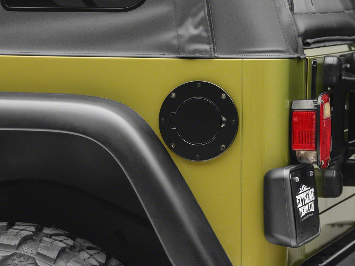 Smittybilt Jeep Wrangler Gas Cover - Billet Style - Gloss Black 75006  (97-06 Jeep Wrangler TJ)