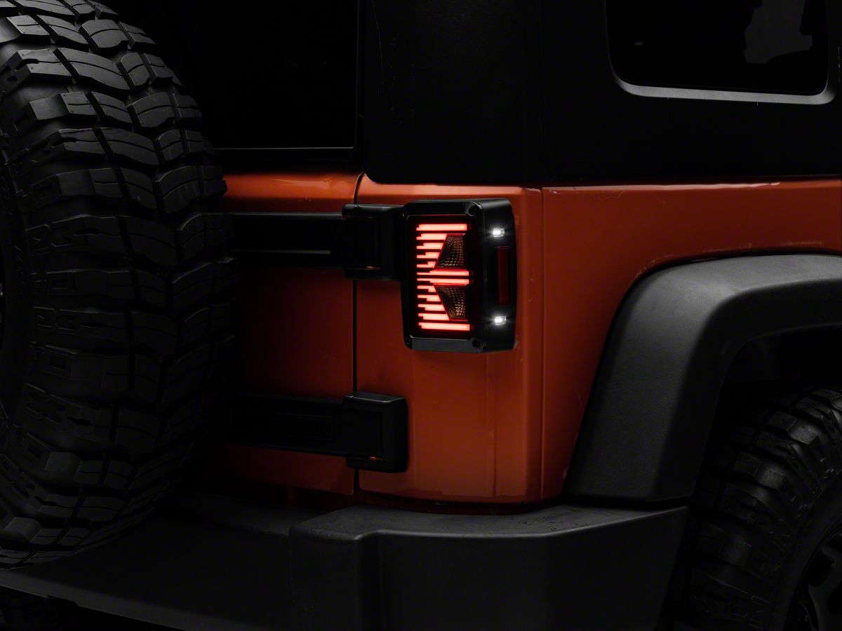 Raxiom Jeep Wrangler Axial Series Vision LED Tail Lights; Black Housing;  Smoked Lens J130808 (07-18 Jeep Wrangler JK) - Free Shipping