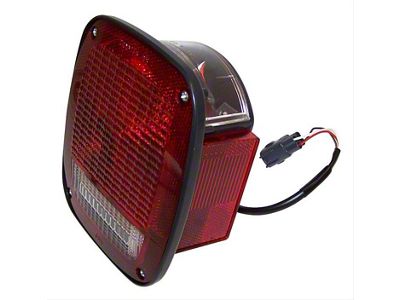 Tail Light; Chrome Housing; Red/Clear Lens; Driver Side (98-06 Jeep Wrangler)