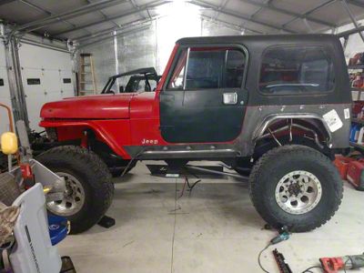 Wizard Works Offroad Rear Armor with Tube Flares; Bare Steel (87-95 Jeep Wrangler YJ)