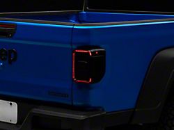 Multi-Function LED Tail Lights; Black Housing; Smoked Lens (20-23 Jeep Gladiator JT w/ Factory Halogen Tail Lights)