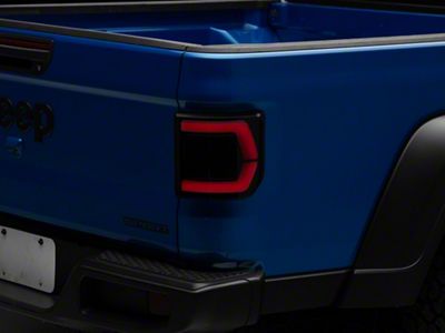 Raxiom Low Profile LED Tail Lights; Black Housing; Smoked Lens (20-24 Jeep Gladiator JT w/ Factory Halogen Tail Lights)