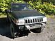 Affordable Offroad Shorty Winch Front Bumper; Bare Metal (93-98 Jeep Grand Cherokee ZJ)