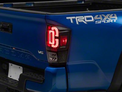 Raxiom XW Series Sequential LED Tail Lights; Black Housing; Clear Lens (16-23 Tacoma)