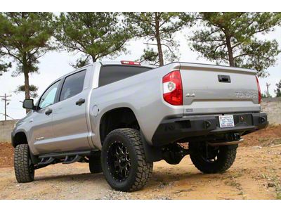Fab Fours Premium Rear Bumper; Not-Drilled for Backup Sensors; Bare Steel (14-21 Tundra)